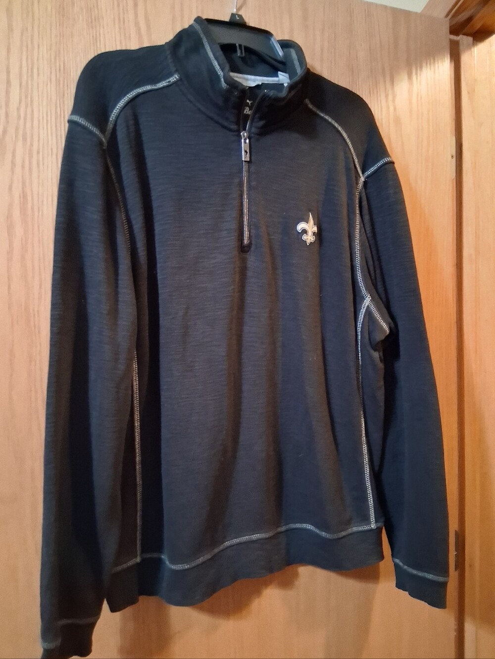 Tommy Bahama half-zip sweatshirt featuring  New Orleans Saints NFL team logo